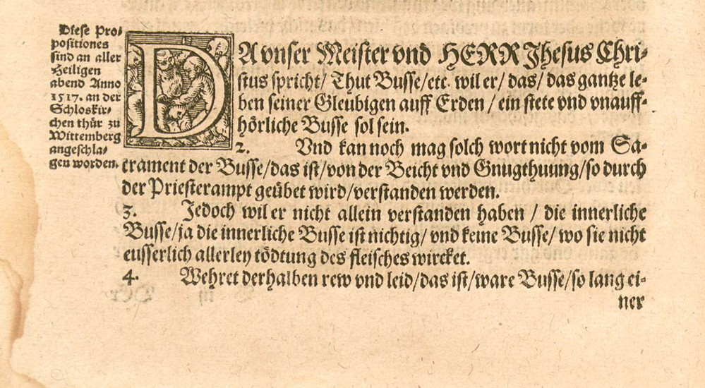 Martin Luther skrev 95 teser mod afladen og tømrede dem fast på døren af slotskirken i Wittenberg.